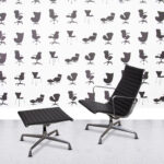 Refurbished Vitra Eames EA119 with Ottoman - Black Leather - Polished Aluminium